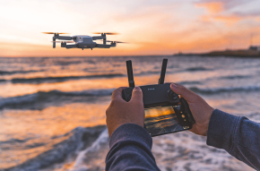 Drone flying over the ocean