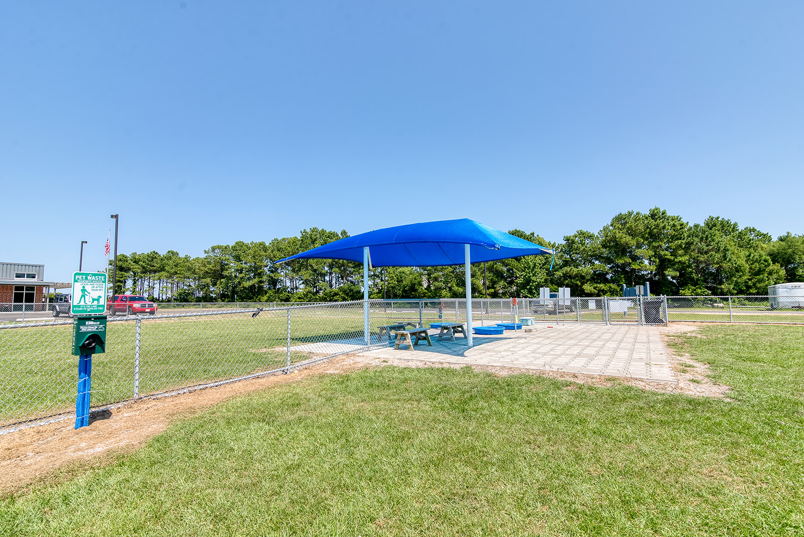 Image of dog park showcasing the shelter.