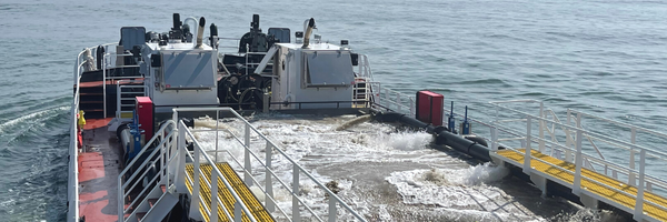 Image of Miss Katie hopper filled with a load of sand.