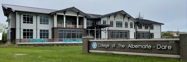 Image of the exterior of the College of the Albemarle Dare facility, taken from the road.