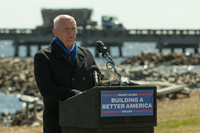 Chairman Woodard speaking at a podium