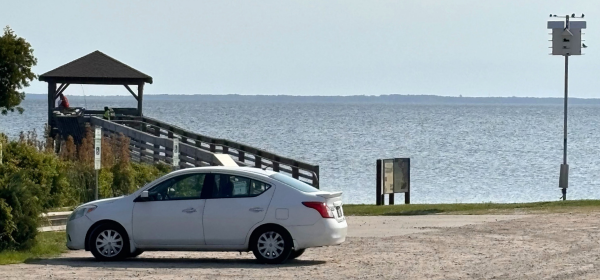 Bebop Fishing Pier with a white car parked in the parking lot.