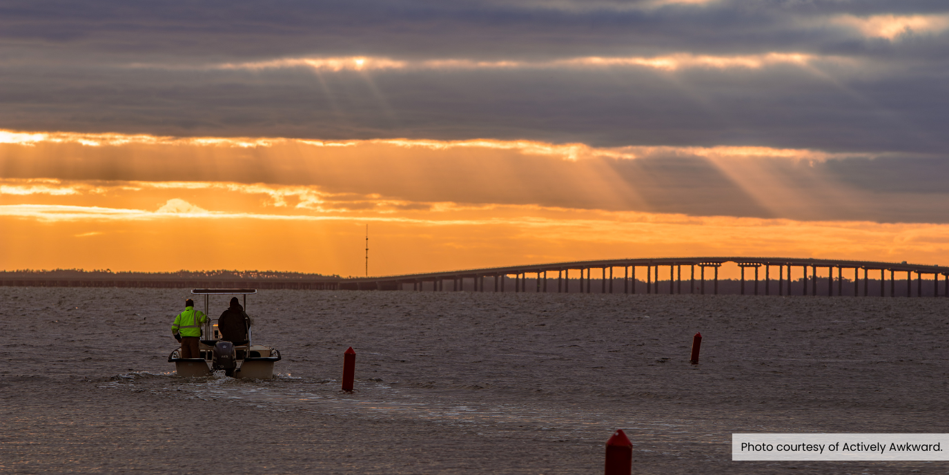 Image of a commercial fishing boat going out of Manns Harbor Marina. Photo courtesy of Actively Awkward.