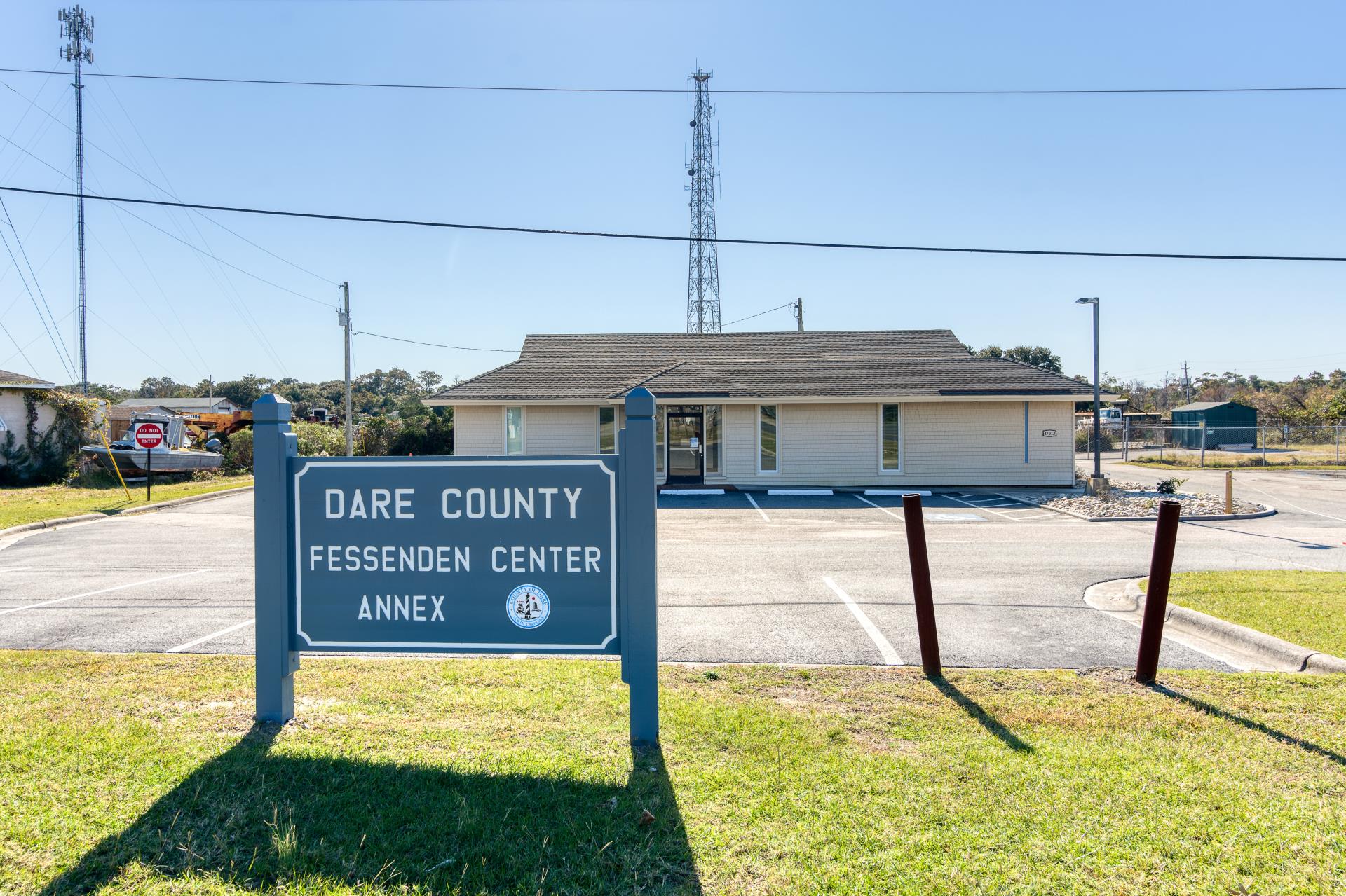 Exterior of a small building with a sign that reads, "Dare County Fessenden Center Annex"