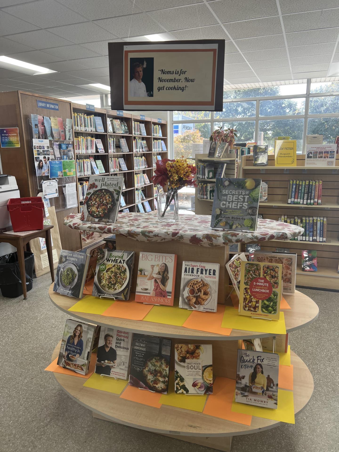 Manteo Library November Book Display - Noms is for November.  Now get cooking!  Display shows cook books